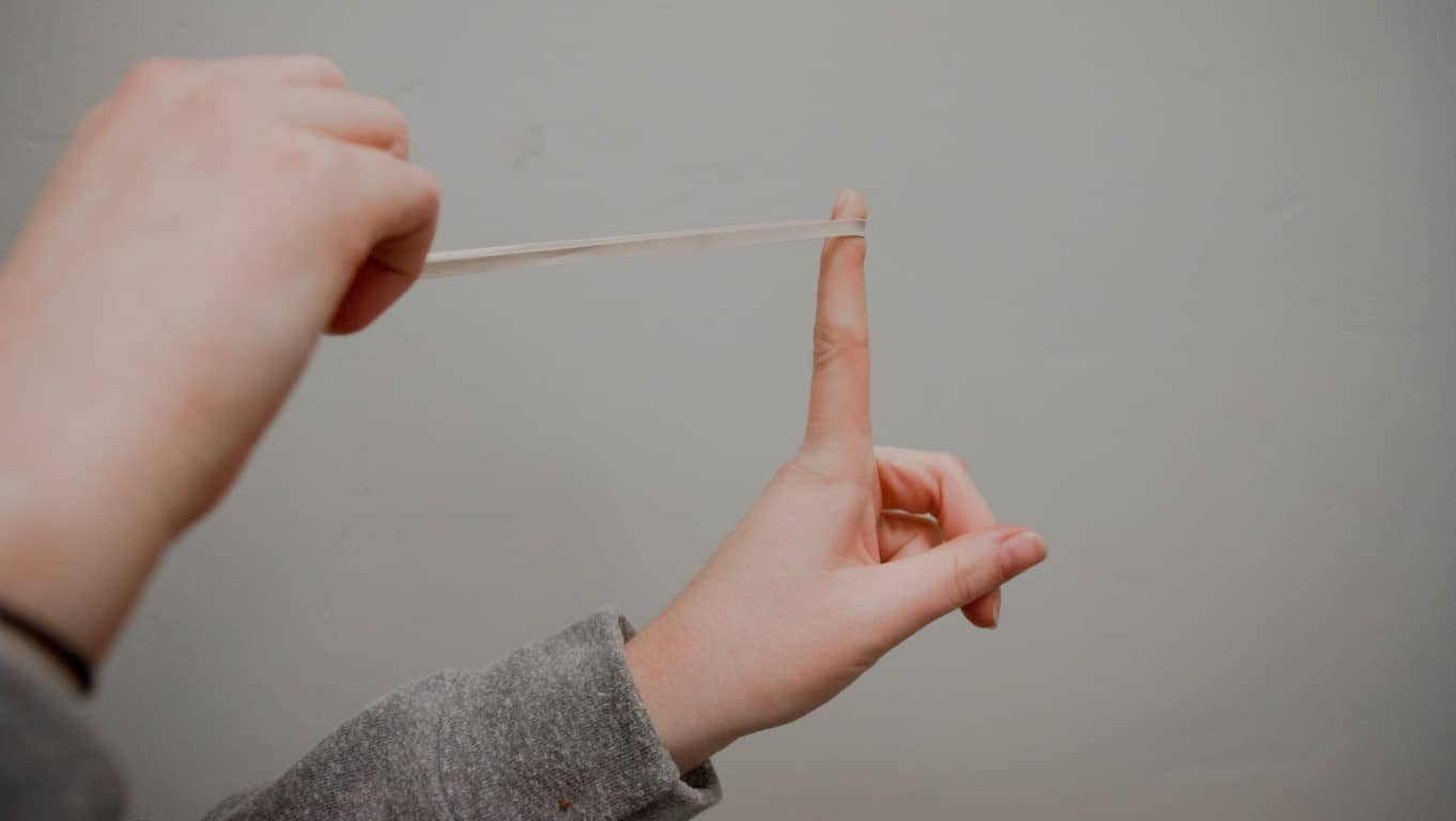 Elastic band being stretched